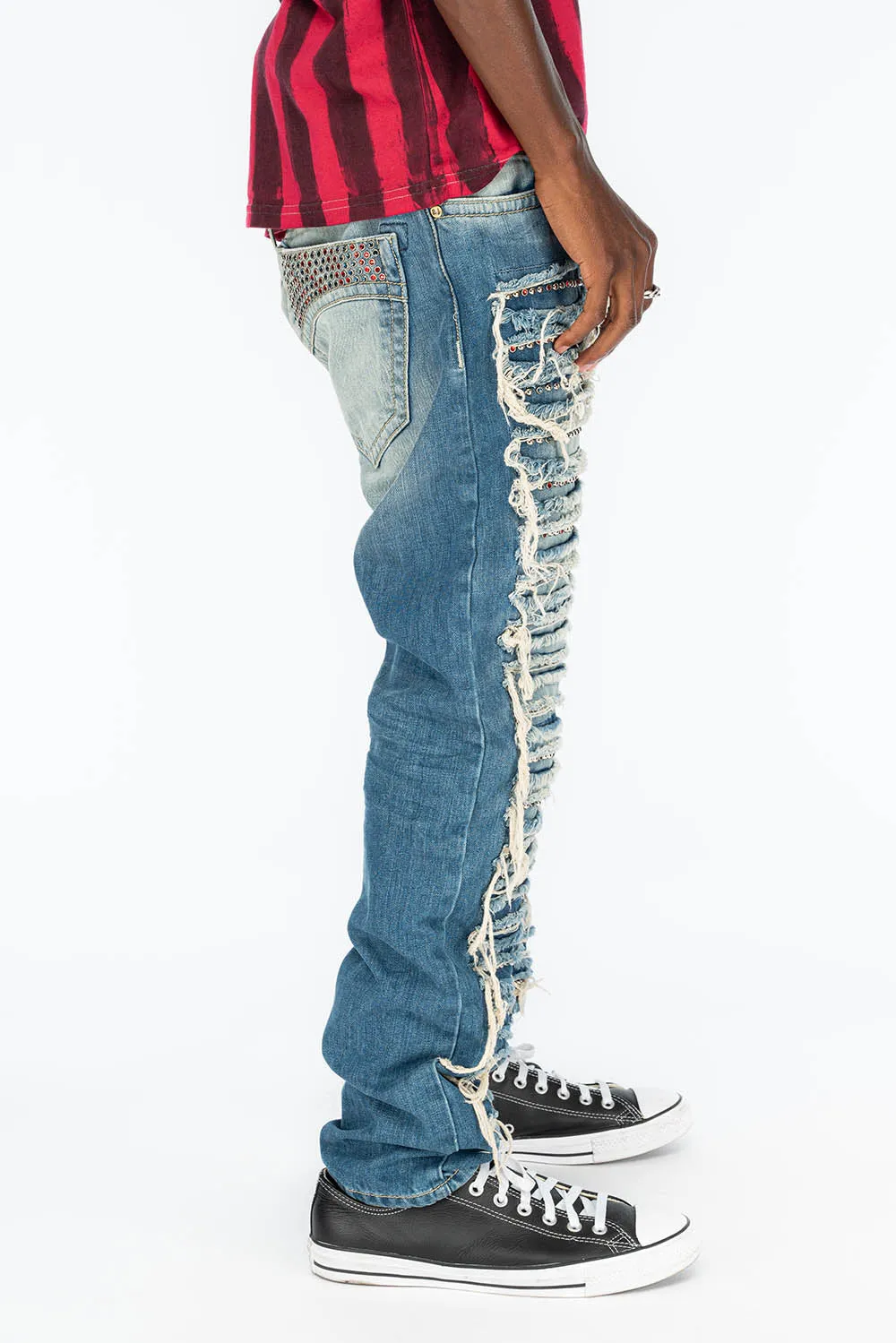 MARLON RIPPED,BROKEN HAND REPAIRED DENIM JEANS IN  MANDAN BLUE WITH STUDS AND CRYSTALS