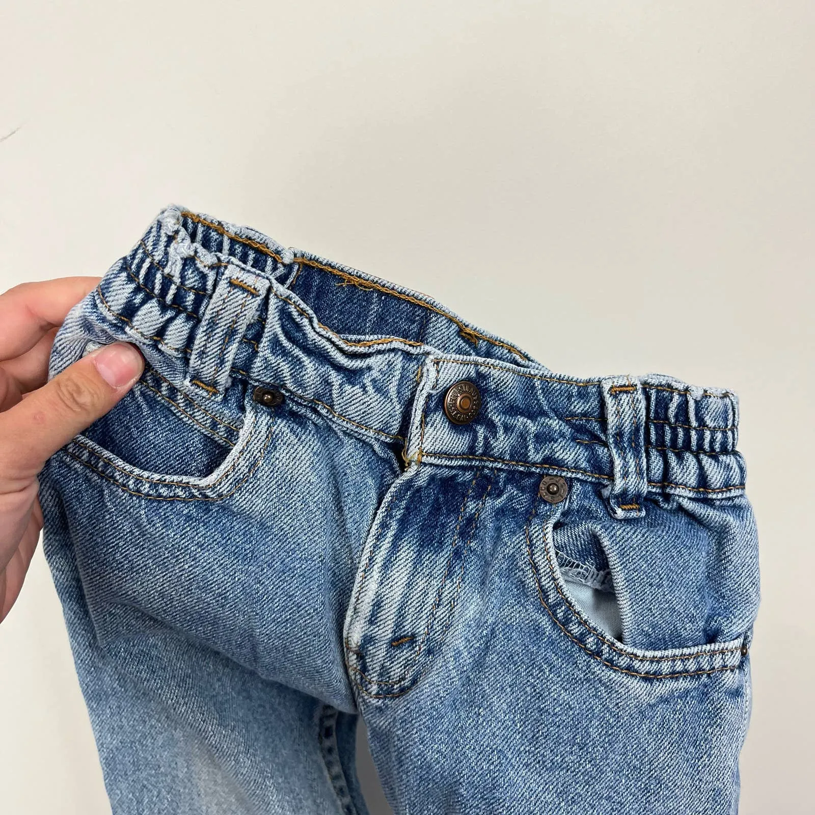 Vintage Levi's 566 Loose Fit Orange Tab Jeans 2T