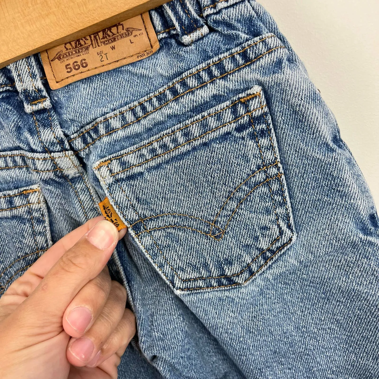 Vintage Levi's 566 Loose Fit Orange Tab Jeans 2T