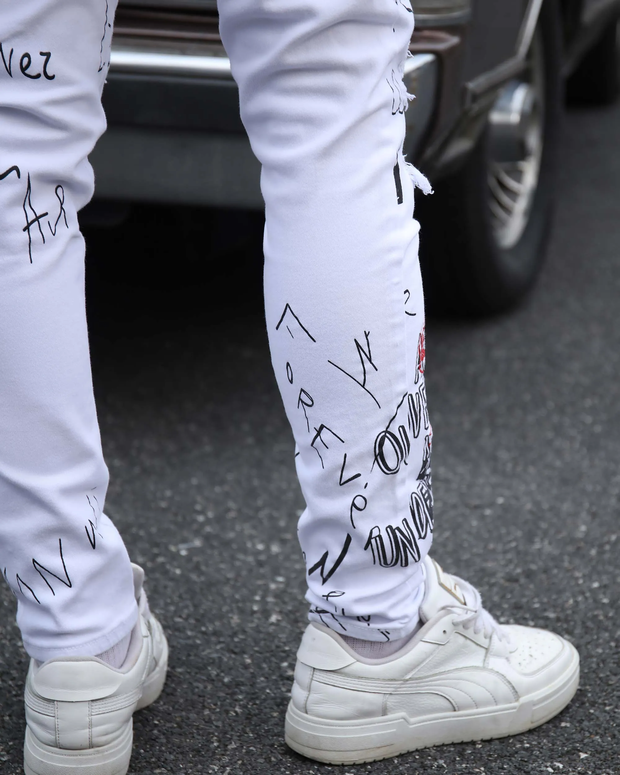 White Ripped Jeans with Colorful Graffiti and Embroidery