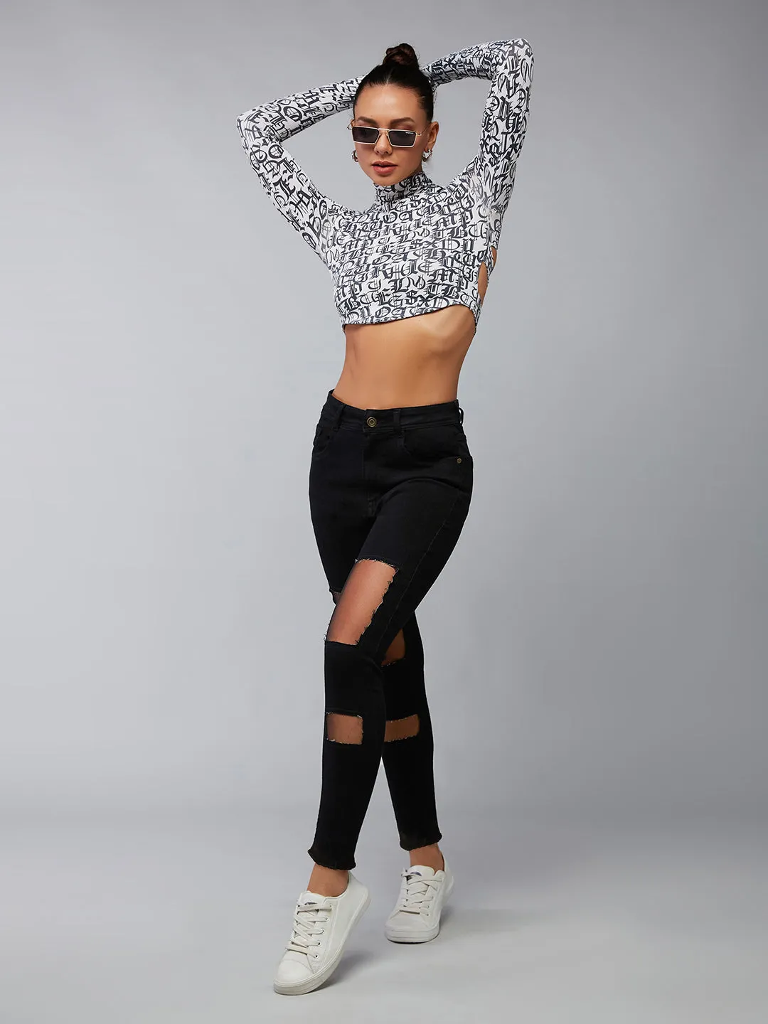 Women's Black Slim Fit High Rise Mild Distressed Ripped Net Detailing Denim Stretchable Jeans
